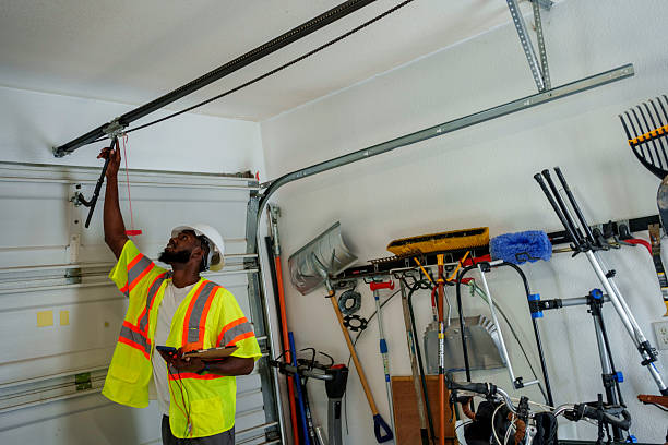 Professional Garage Door Panel Replacement technician working in Emmett, ID